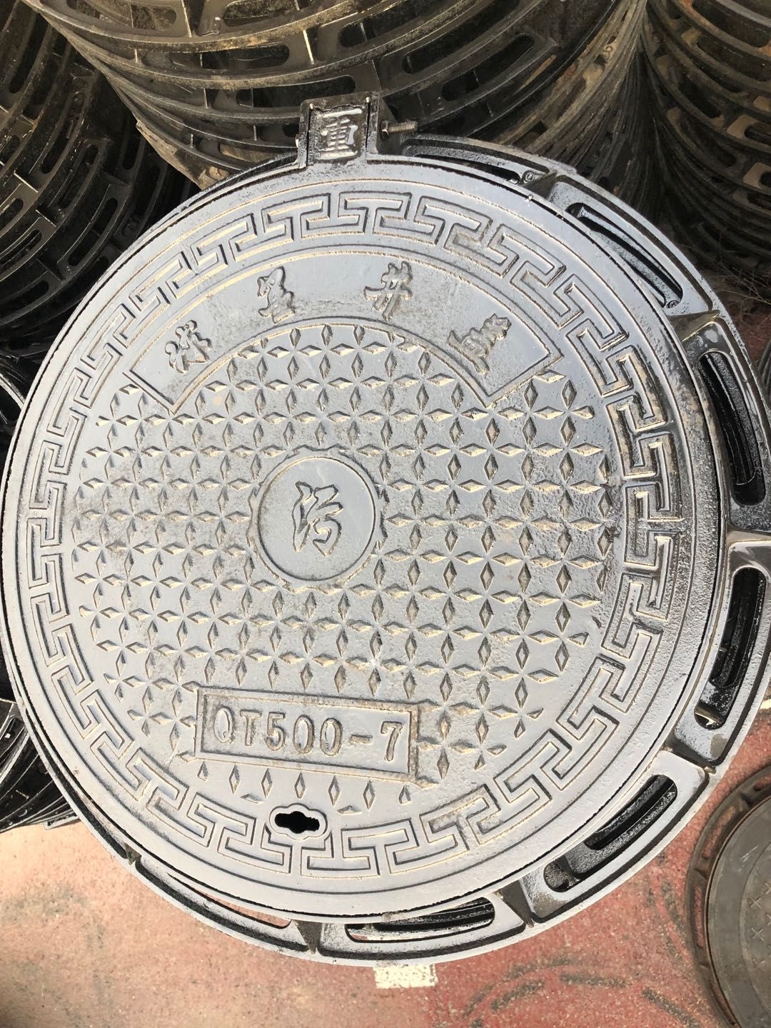 Crafting Quality and Safety: The Design and Manufacturing of Durable Cast Iron Manhole Covers for Commercial Use